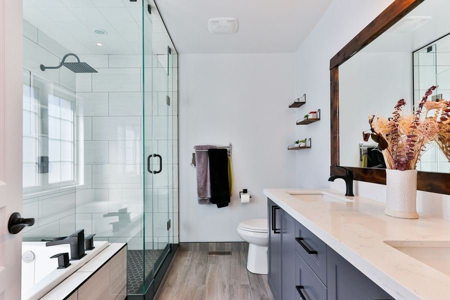 Modern bathroom with glass shower and double vanity